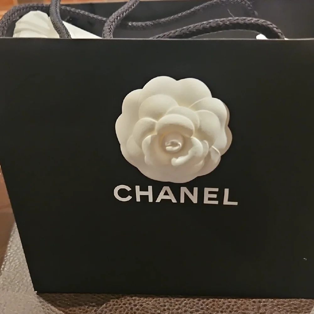 Chanel Black Gift Bag with White Camellia Flower Accent